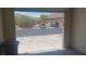 Spacious two car garage with parking space and view of neighborhood at 864 Chianti Way, Mesquite, NV 89027