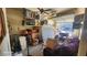 Spacious garage featuring ample storage, shelving, and potential for a workshop area at 864 Chianti Way, Mesquite, NV 89027
