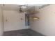 Spacious garage featuring installed shelving and a water heater at 864 Chianti Way, Mesquite, NV 89027