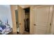 Hallway closet with vacuums and storage, providing functionality and tidy living at 864 Chianti Way, Mesquite, NV 89027