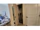 Hallway closet with vacuums and storage, contributing to a tidy and well-organized living space at 864 Chianti Way, Mesquite, NV 89027