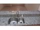 Modern double bowl kitchen sink with stylish countertops and fixtures at 864 Chianti Way, Mesquite, NV 89027