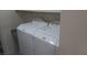 Laundry area showcasing a white washer and dryer set at 864 Chianti Way, Mesquite, NV 89027