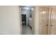 A utility room with a washer, dryer, and shelving for organized storage at 864 Chianti Way, Mesquite, NV 89027