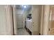 Laundry room features machines and storage, making household tasks easier and keeping your home organized at 864 Chianti Way, Mesquite, NV 89027