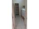Laundry room with tile flooring, washer, dryer, and shelving at 864 Chianti Way, Mesquite, NV 89027
