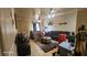 Charming living room with a comfortable sofa, ceiling fan, and plenty of space at 864 Chianti Way, Mesquite, NV 89027