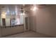 Open-concept living area with tile floors and views into the kitchen and hallway at 864 Chianti Way, Mesquite, NV 89027