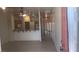 Open-concept living area with tile floors and views into the kitchen and hallway at 864 Chianti Way, Mesquite, NV 89027