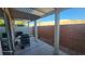 Backyard patio featuring grill and shade cover, ideal for outdoor living at 864 Chianti Way, Mesquite, NV 89027