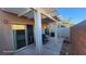 Covered patio with grill, providing a perfect space for outdoor entertainment at 864 Chianti Way, Mesquite, NV 89027