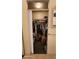 Walk-in closet with shelf storage, hanging racks and folding doors at 864 Chianti Way, Mesquite, NV 89027
