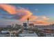 Breathtaking view of the Las Vegas skyline at sunset, showcasing the Stratosphere Tower and the vibrant cityscape at 900 S Las Vegas Blvd # 1208, Las Vegas, NV 89101