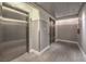 Clean and modern elevator lobby with stainless steel elevator doors and neutral wall colors at 900 S Las Vegas Blvd # 1208, Las Vegas, NV 89101