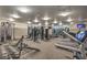 Spacious gym area with weight machines, treadmills, weights, and a wall-mounted television at 900 S Las Vegas Blvd # 1208, Las Vegas, NV 89101
