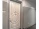 Hallway view with unit number and door with decorative molding at 900 S Las Vegas Blvd # 1208, Las Vegas, NV 89101