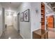 Bright hallway showcasing art, lighting, and glimpses of the kitchen and living area at 900 S Las Vegas Blvd # 1208, Las Vegas, NV 89101