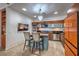 Modern kitchen with stainless steel appliances, sleek cabinetry, and a stylish breakfast bar at 900 S Las Vegas Blvd # 1208, Las Vegas, NV 89101