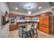 Modern kitchen with granite countertops, sleek cabinetry, stainless steel appliances and stylish barstool seating at 900 S Las Vegas Blvd # 1208, Las Vegas, NV 89101