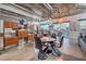 Open living area with dining space, city views, and modern industrial ceiling features at 900 S Las Vegas Blvd # 1208, Las Vegas, NV 89101