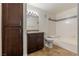 Full bathroom features a vanity, cabinet, large mirror, and tiled shower-tub combo at 950 Seven Hills Dr # 2924, Henderson, NV 89052