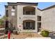 Attractive condo building featuring stucco facade, private balconies, and well-maintained landscaping at 950 Seven Hills Dr # 2924, Henderson, NV 89052