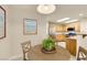Charming eat-in kitchen featuring oak cabinets, stainless steel appliances, and a view of the main kitchen at 10311 Birch Bluff Lane Ln, Las Vegas, NV 89145