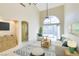 Bright living room with high ceilings, large window, neutral decor, and stylish furniture, perfect for relaxation at 10311 Birch Bluff Lane Ln, Las Vegas, NV 89145