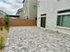 Spacious backyard with a paved patio area and low-maintenance landscaping at 10376 Joaquin Fire St, Las Vegas, NV 89141