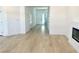 Bright foyer showing stairs and view of the main living space with sleek floors at 10376 Joaquin Fire St, Las Vegas, NV 89141