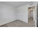 Neutral bedroom with closet, carpeted floor, white walls, and doorway at 10773 Bede Ct, Las Vegas, NV 89166