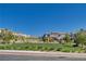 Community park and playground area featuring lush lawn, walking path, and picnic area at 10773 Bede Ct, Las Vegas, NV 89166