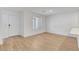 Bright living room area with wood flooring and plenty of natural light at 10773 Bede Ct, Las Vegas, NV 89166