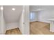 Living room featuring hardwood floors and natural light creating an inviting space at 10773 Bede Ct, Las Vegas, NV 89166