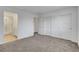 Spacious main bedroom featuring carpet, a closet, and a connecting bathroom at 10773 Bede Ct, Las Vegas, NV 89166