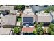 Aerial view of a backyard featuring a pool, hot tub, solar panels, and turf at 11134 Casala Ct, Las Vegas, NV 89141