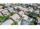 An aerial view showcases a neighborhood with well-maintained homes, mature trees, and a community feel at 11134 Casala Ct, Las Vegas, NV 89141