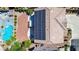 A top-down shot displays the property's solar panels, brick patio, and a sparkling pool area at 11134 Casala Ct, Las Vegas, NV 89141