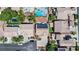 A detailed overhead view highlights the arrangement of homes, yards, and pools in a suburban neighborhood at 11134 Casala Ct, Las Vegas, NV 89141