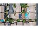 Overhead shot shows homes with pools and well-kept lawns in a neatly organized residential layout at 11134 Casala Ct, Las Vegas, NV 89141