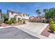 Inviting two-story home featuring a spacious three-car garage and well-manicured front yard at 11134 Casala Ct, Las Vegas, NV 89141
