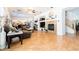 Spacious living room with wood floors, ceiling fan, fireplace and comfortable seating at 11134 Casala Ct, Las Vegas, NV 89141