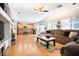 Bright, open concept living room flowing into the kitchen and dining areas at 11134 Casala Ct, Las Vegas, NV 89141