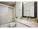 Cozy bathroom featuring shower over tub and granite vanity at 11157 Sandy Grove Ave, Las Vegas, NV 89144