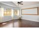 Spacious bedroom with lots of natural light and wood floors at 11157 Sandy Grove Ave, Las Vegas, NV 89144