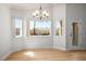 This dining room features three windows for ample natural light and views of the backyard at 11157 Sandy Grove Ave, Las Vegas, NV 89144