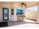 Covered patio with fan and view of the pool and backyard at 11157 Sandy Grove Ave, Las Vegas, NV 89144