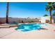 Private backyard oasis featuring a sparkling pool and lush landscaping at 11157 Sandy Grove Ave, Las Vegas, NV 89144