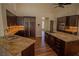 Well-equipped kitchen featuring granite countertops, stainless steel appliances, and ample cabinet space at 185 Camrose St, Henderson, NV 89074