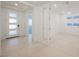 Bright, spacious foyer with tile flooring and ample natural light at 19 Desert Ivy Ln, Henderson, NV 89011